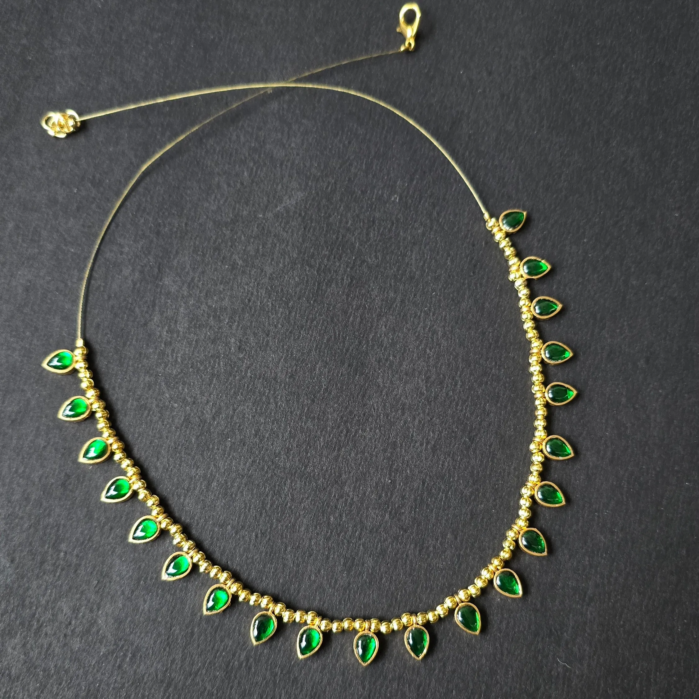 Green Invisible Chain With Golden Pearls